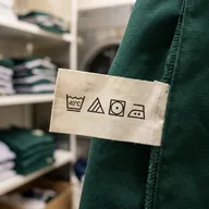 Close-up of a care label showing only wash symbols
