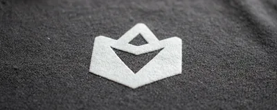 The same logo screen printed on cotton